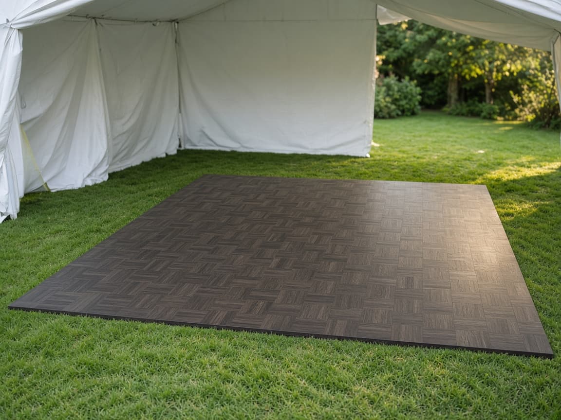 Representative photo of a dark maple dance floor at the edge of a frame tent.